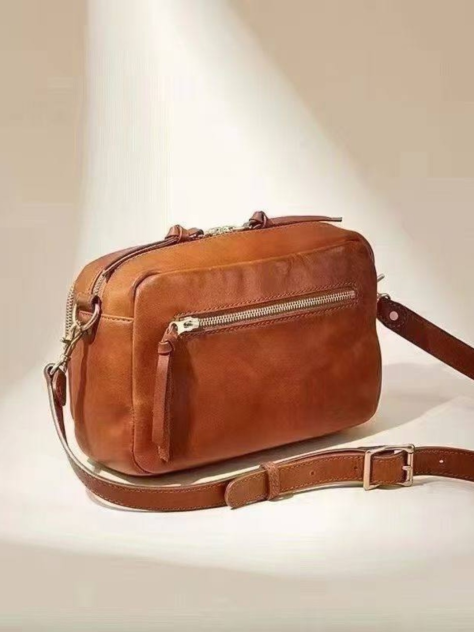 ტყავის ჩანთები