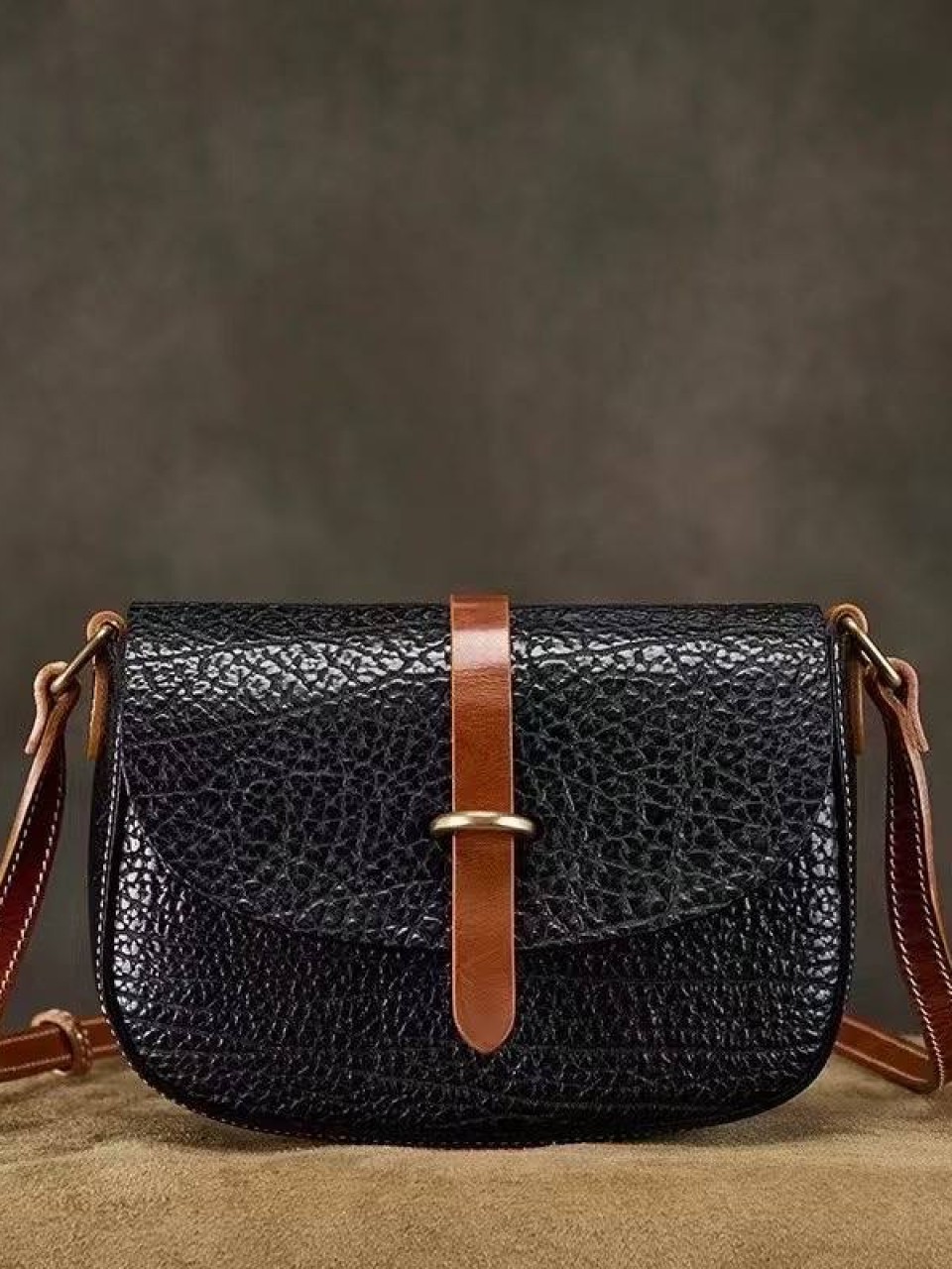 ტყავის ჩანთები