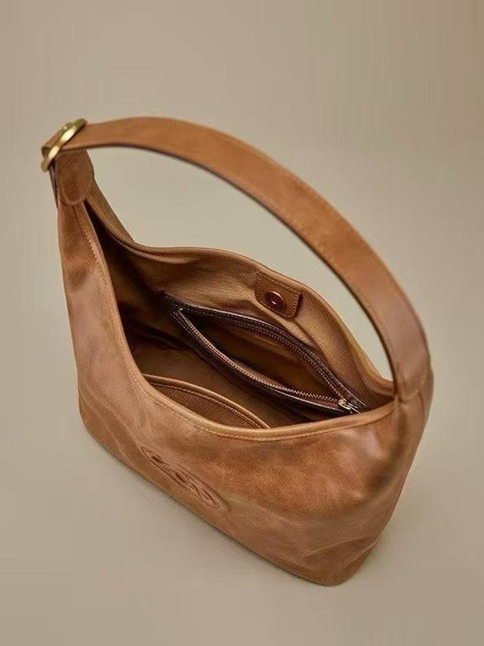 ტყავის ჩანთები