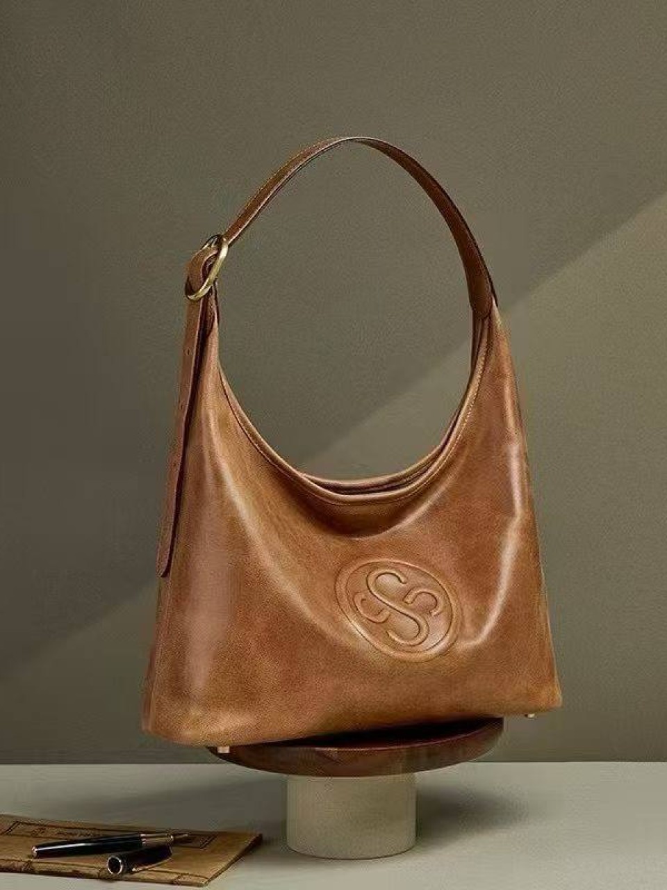 ტყავის ჩანთები